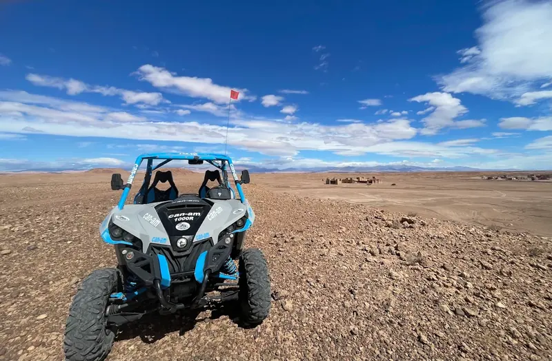 An off road buggy on a stony desert plain
