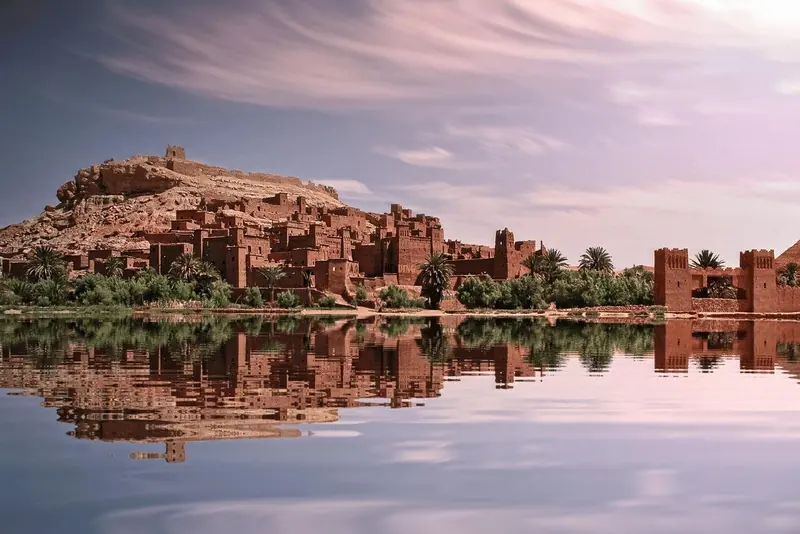 The ksar of Ait Ben Haddou reflected in the river at dusk